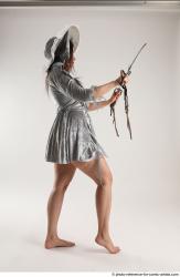 Woman Adult Athletic White Fighting with sword Standing poses Casual